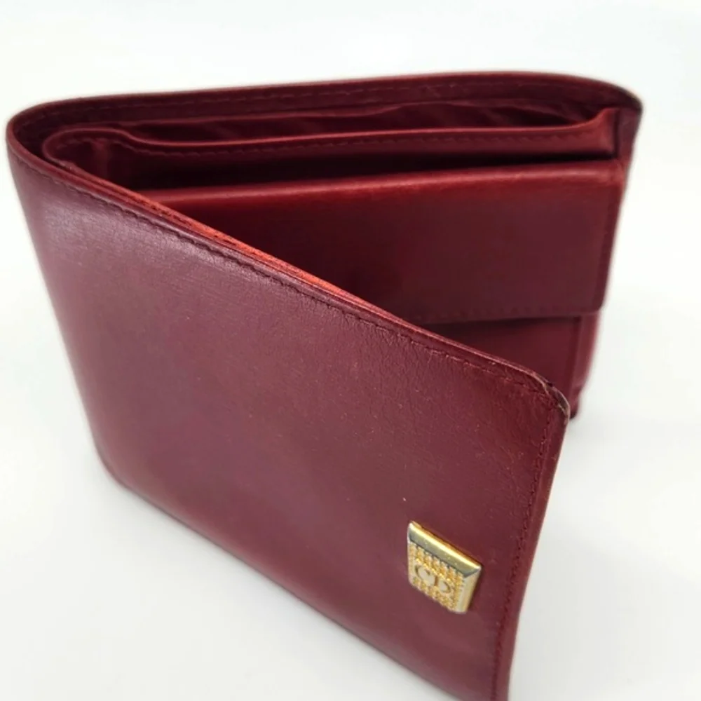 Dior Burgundy Wallet with Gold “CD” Accent. Good condition.